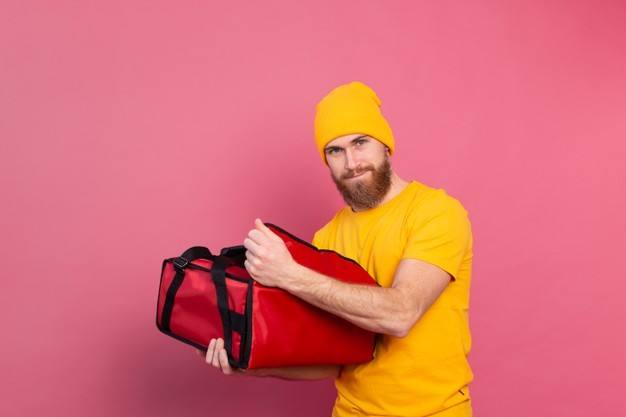 cheerful-european-bearded-delivery-man-surprised-emotions-open-b