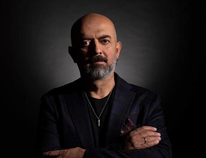 Studio portrait photograph of Assoc. Prof. Dr. Yalçın Bayram, Plastic and Aesthetic Surgeon.