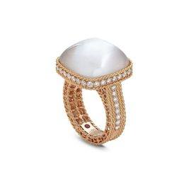 ROMAN BAROCCO ring in 18kt rose gold with diamonds and doublet of mother of pearl and quartz. Mother of pearl weight (total) 15.20 ct Diamonds weight (total) 1 ct