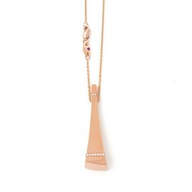 SAUVAGE PRIVE’ pendant in 18kt gold with diamonds. 18kt gold chain. Diamonds weight (total) 0.30 ct