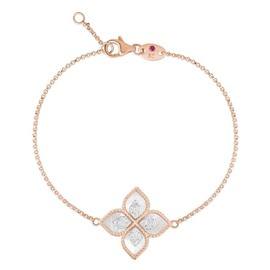 PRINCESS FLOWER bracelet in 18kt gold with mother of pearl and diamonds. Mother of pearl weight (total) 3.40 ct Diamonds weight (total) 0.19 ct