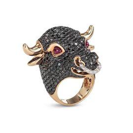 ANIMALIER Bull limited edition ring in 18kt rose gold with white diamonds, black diamonds and brown rubies and black sapphires. Diamonds weight (total) 7.51 ct Rubies weight (total) 0.76 ct