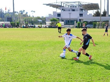 FC Sabah Youngster Battling for the Ball in Open Play