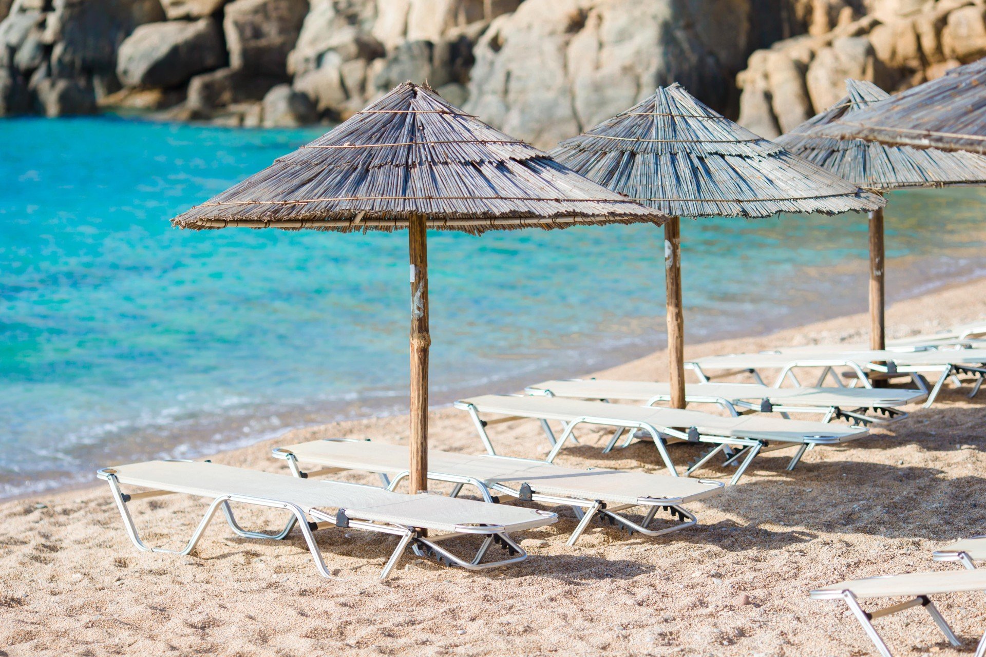beach-wooden-chairs-and-umbrellas-for-vacations-on-202