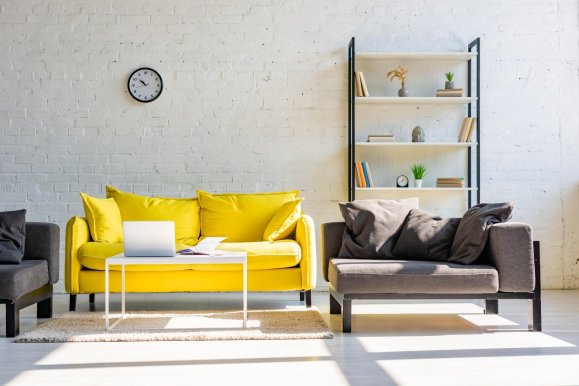 living-room-with-yellow-sofa-grey-armchairs-shel-2023-
