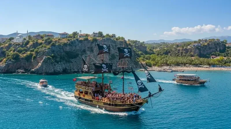 Pirate boats sailing along the cliffs of the Antalya coast