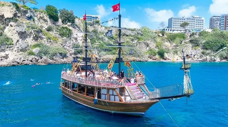 Double-deck relax boat cruising the Konyaaltı coast of Antalya