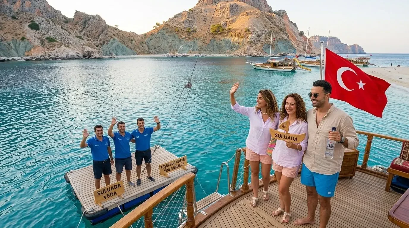 The Cengiz 1 crew waving goodbye to guests at the end of the Suluada day