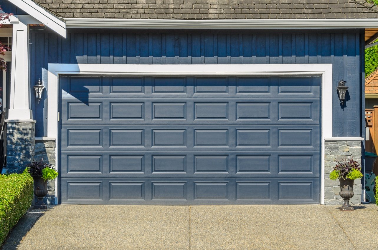 Blue sectional overhead garage door